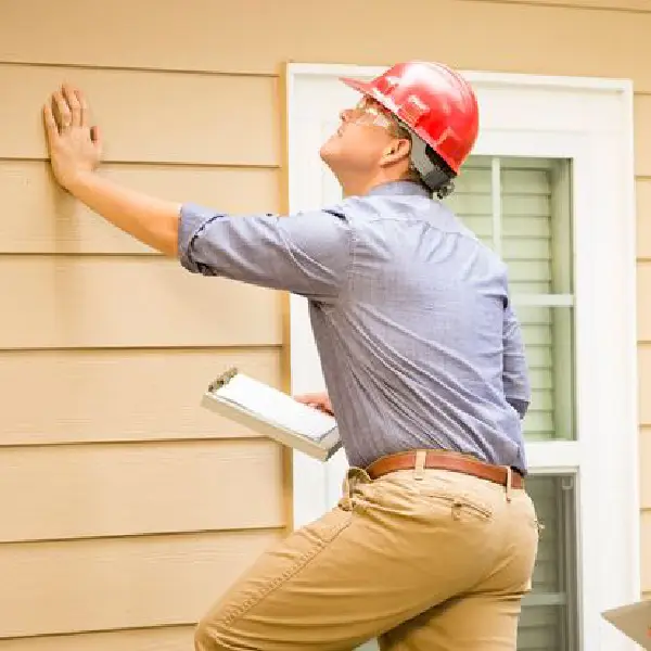 lead paint inspector inspecting the house